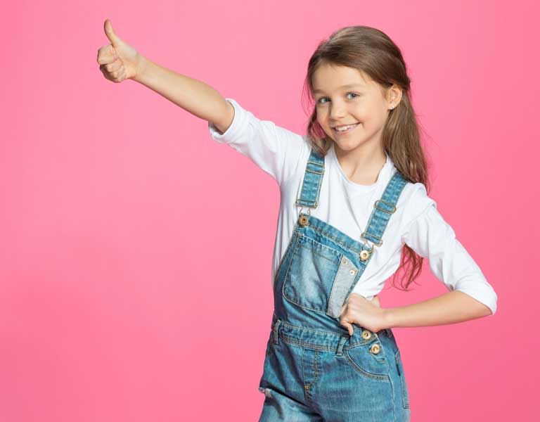 Girl showing a thumbs up in Stafford, VA
