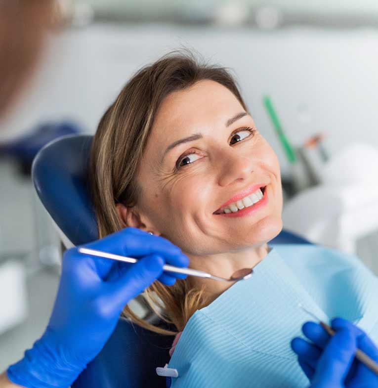 Woman having a dental check-up in a dentist’s office in Stafford, VA